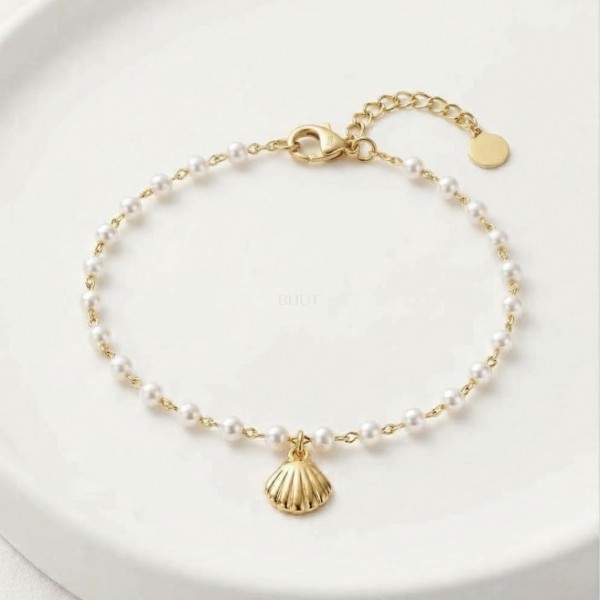 Pulseira pérolas pendente concha 